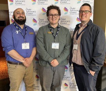 Y Staff James, Ari, and Terrence attending the Child Advocacy Center of Greater Rochester annual meeting