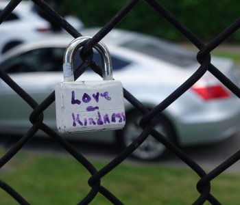 love on fence outside lewis street ymca neighborhood center